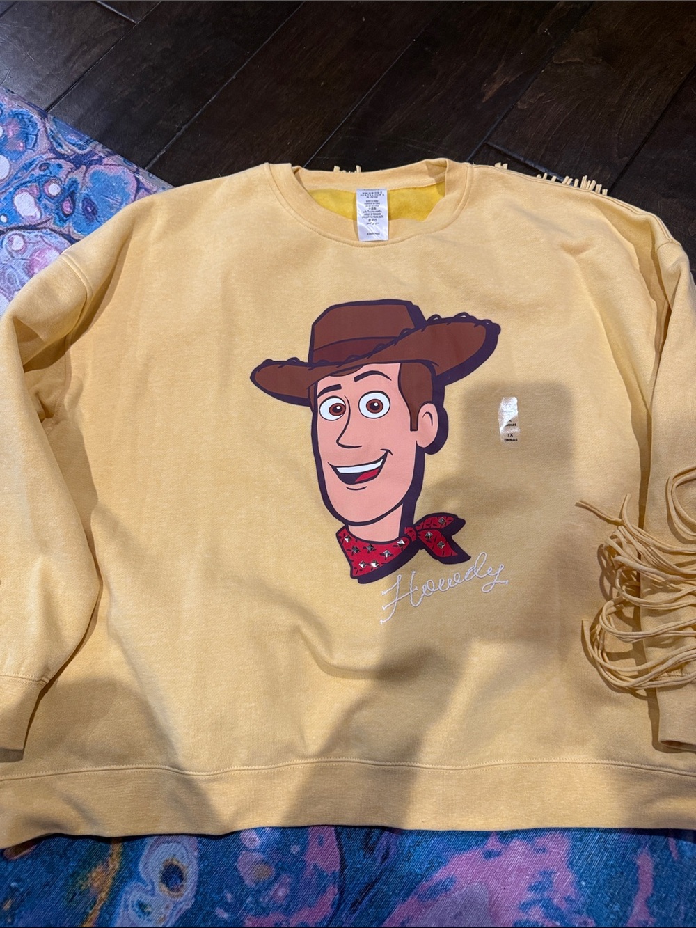 NWOT Woody sweatshirt. Size 1x. Super cute fringe on the back and down arms